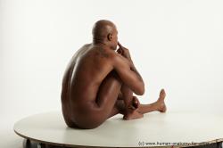 Nude Man Black Sitting poses - simple Slim Bald Sitting poses - ALL Realistic